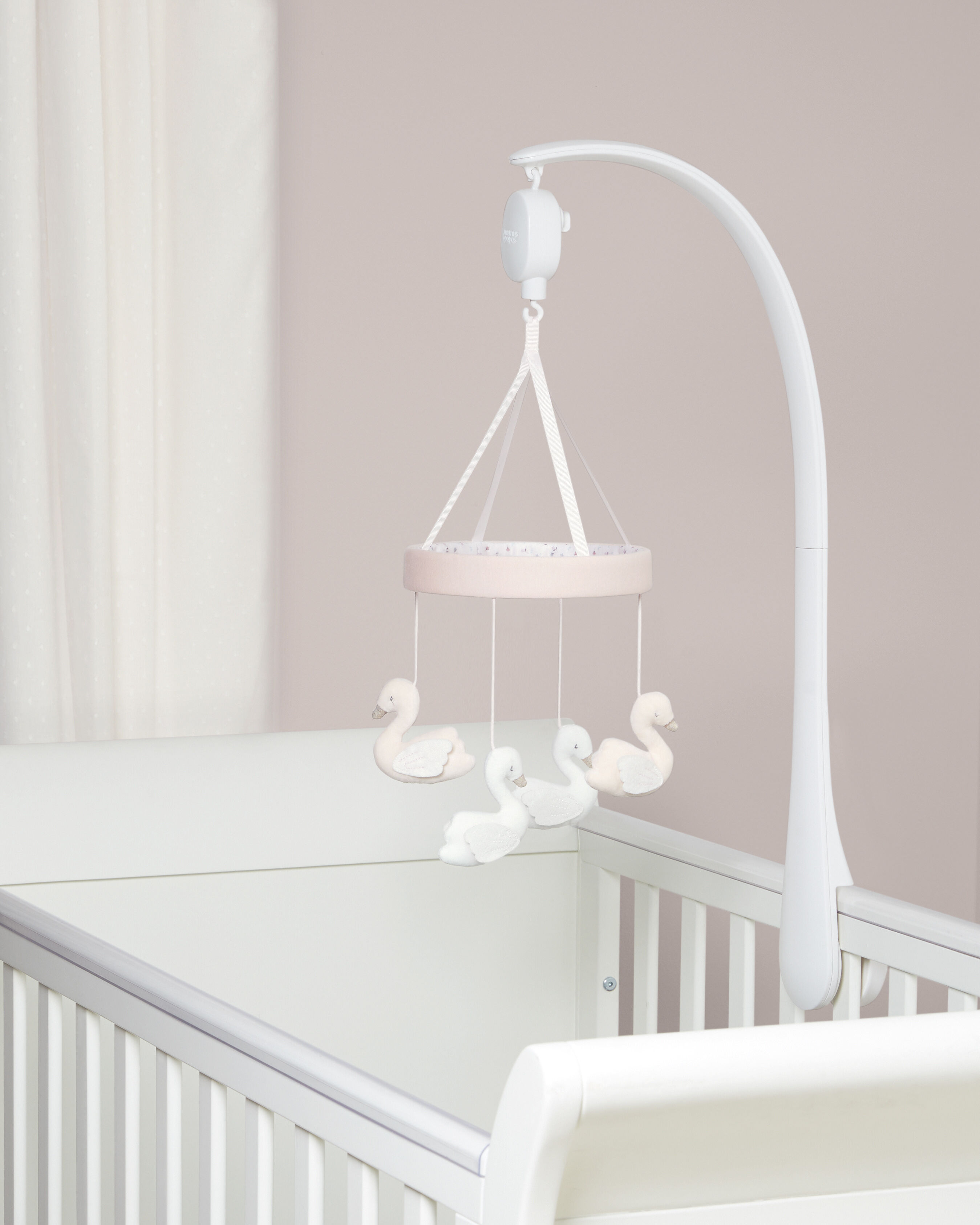 ألعاب مهد متحركة بتصميم زهور بموسيقى ويلكم تو ذا وورلد - وردي وأبيض